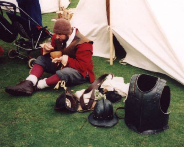Badly Drawn Boy stuffs his face instead of wearing that horrid chafing armour
