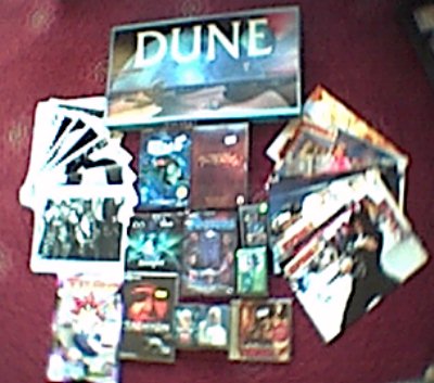 A "Dune" (The movie) board game, the instructions look drawn out and hard to follow (guess they were going for an authentic feel), four base sets of trading cards  "The Two Towers" 4 DVD box set, "Finding Nemo" R1 Spec Ed DVD, "Doctor Who" documentary DVD, "Once Upon a Time in Mexico" CD soundtrack, "Zagreus" Doctor Who audio drama and about 20 FoH stills and press pack photos, mainly from "Once Upon a Time in Mexico" and "Event Horizon", "Tacheyon; The Fringe" PC game and issue 1 of Shonen Jump magazine