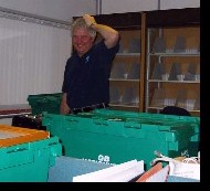 Martin scratches his head as Harold Hill is crated up for moving out