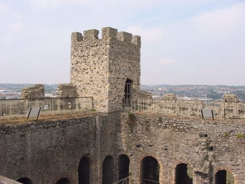The battlements, complete with tennis-ball nuturing pigeons. Amusingly, a danger notice warns the net will not support your weight and you will plummet 100 feet down if you try it.