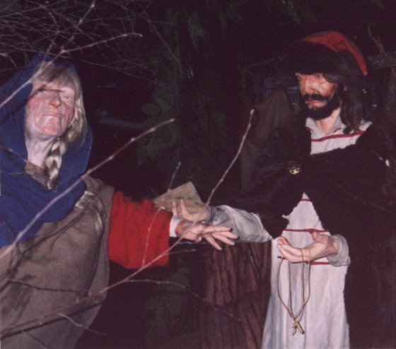 A couple of dirty vikings haggling for cheese or something